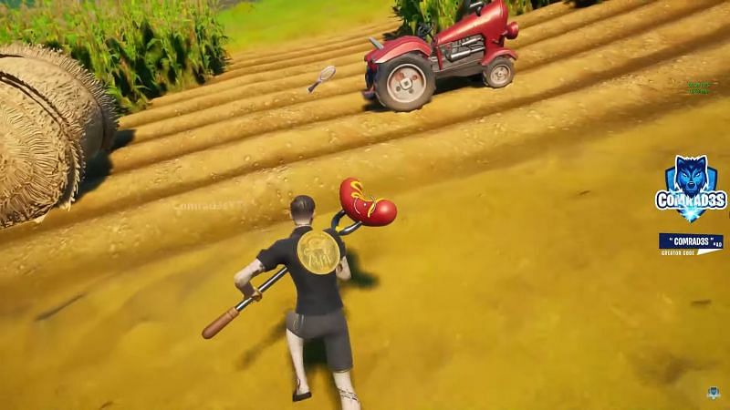 Clue behind the Red Tractor in the field (Image via Comrad3s/YouTube)