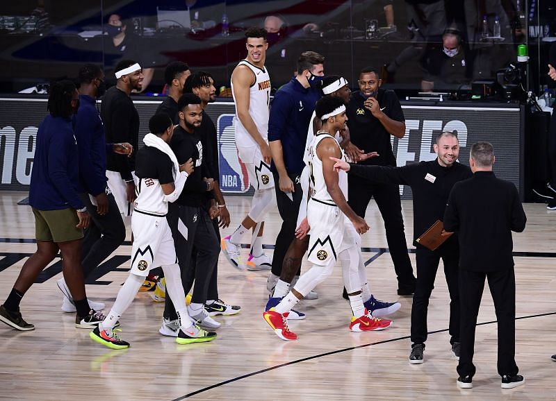 The Denver Nuggets celebrate during the fourth quarter against the LA Clippers in Game Seven of the Western Conference Second Round during the 2020 NBA Playoffs.