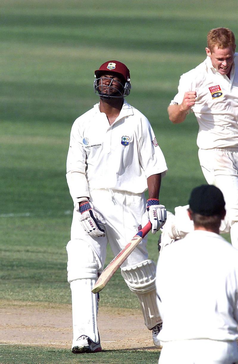 A disappointed Brian Lara walks back after losing his wicket.