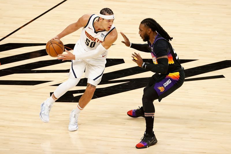Aaron Gordon #50 of the Denver Nuggets handles the ball against Jae Crowder #99 of the Phoenix Suns