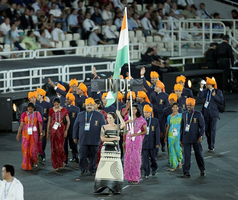 Anju Bobby George carrying the Indian flag at the Opening ceremony of Athens 2004 Olympics