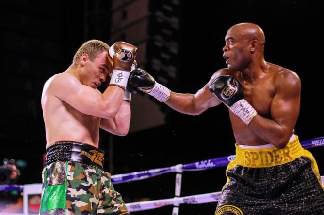 Watch: Anderson Silva clowns Julio Cesar Chavez Jr. by dropping his hands and backing himself into a corner