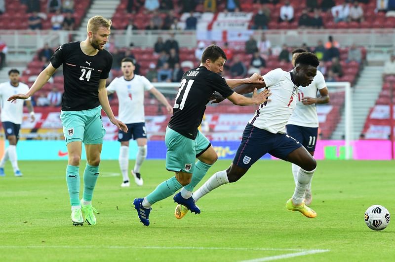 Saka (R) proved to be England&#039;s matchwinner on the night