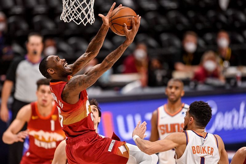 Will Barton #5 of the Denver Nuggets scores.