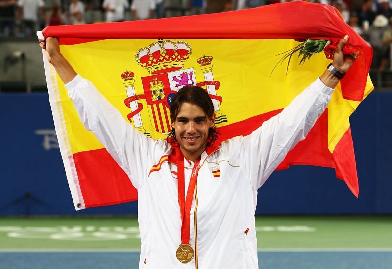 Rafael Nadal holding the Spanish flag