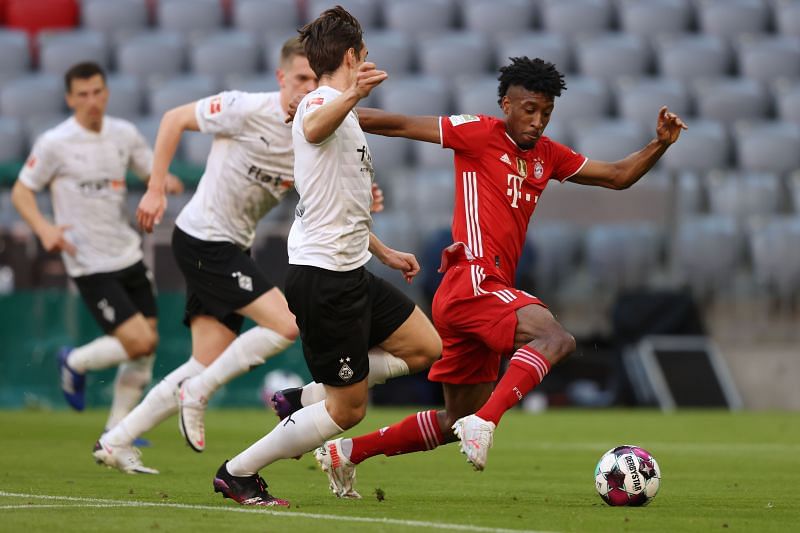 Kingsley Coman (right) scored only seven goals last season. (Photo by Alexander Hassenstein/Getty Images)