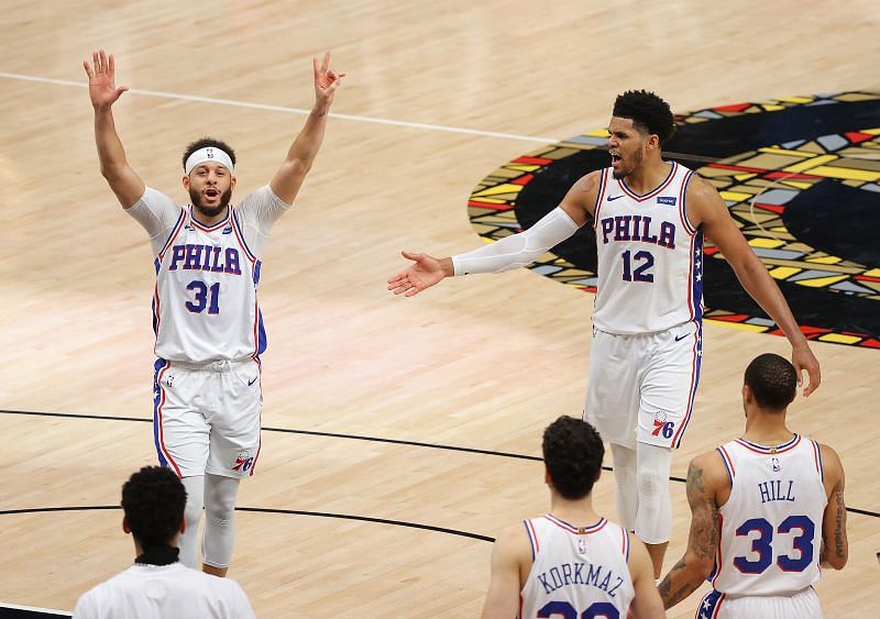 Seth Curry (#31) and Tobias Harris (#12) of the Philadelphia 76ers celebrate their team&#039;s 104-99 win over the Atlanta Hawks.