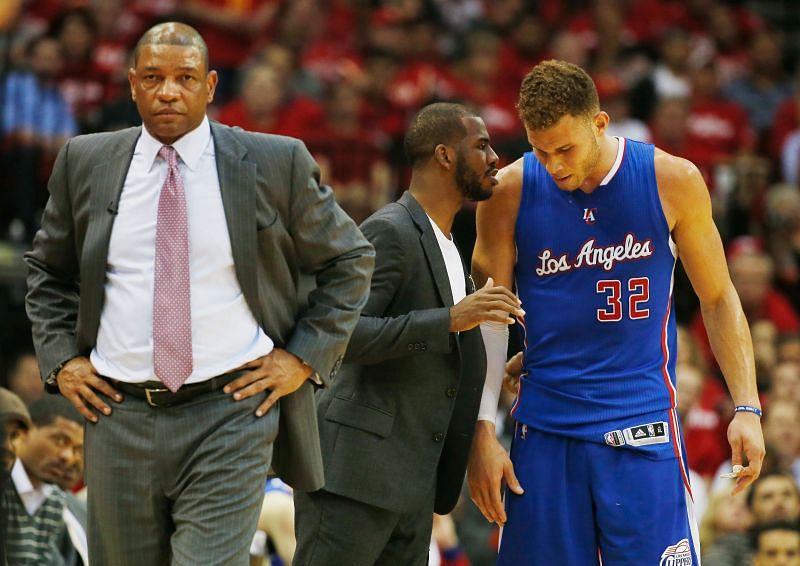 Head coach Doc Rivers of the Los Angeles Clippers alongside Chris Paul (#3) and Blake Griffin (#32)