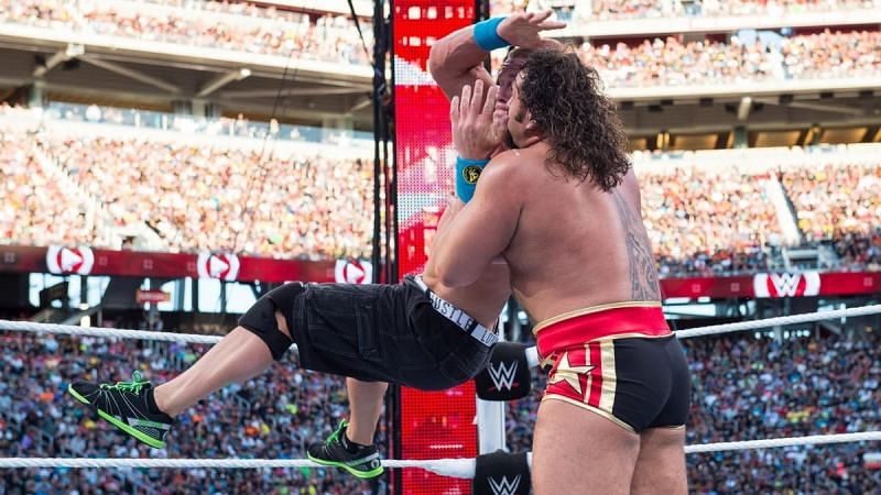 John Cena performing a Springboard Stunner on Rusev