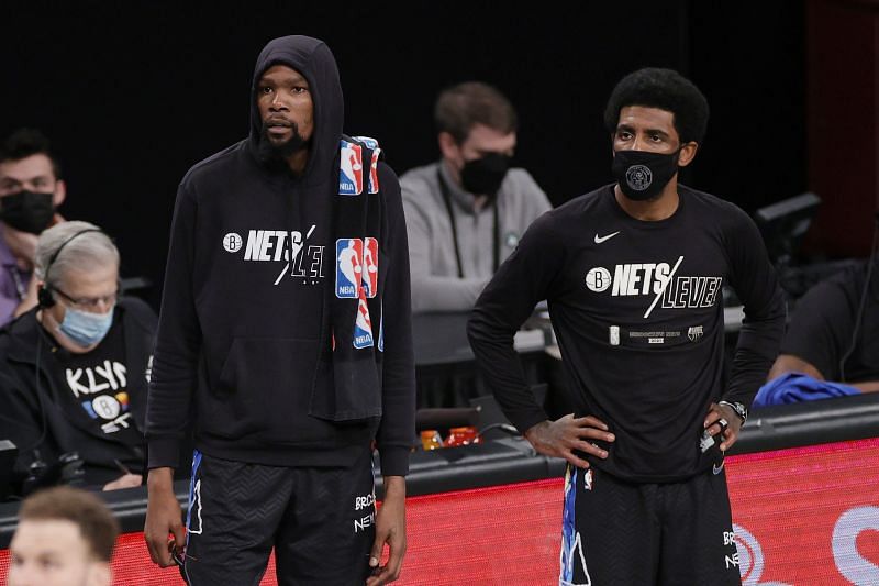 Kevin Durant (#7) and Kyrie Irving (#11) of the Brooklyn Nets