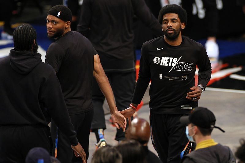 Kyrie Irving (right) of the Brooklyn Nets