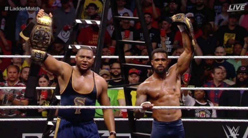 Street Profits holding the NXT Tag Team Titles