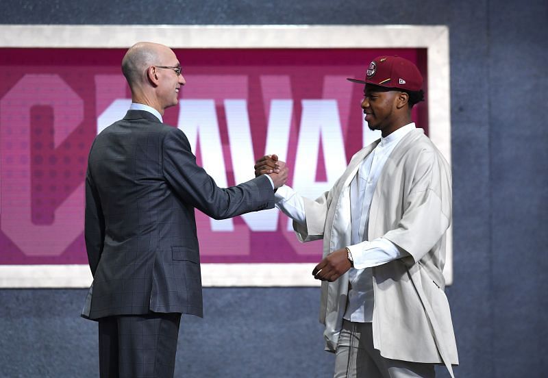 Darius Garland poses with NBA Commissioner Adam Silver after being drafted with the fifth overall pick by the Cavs.