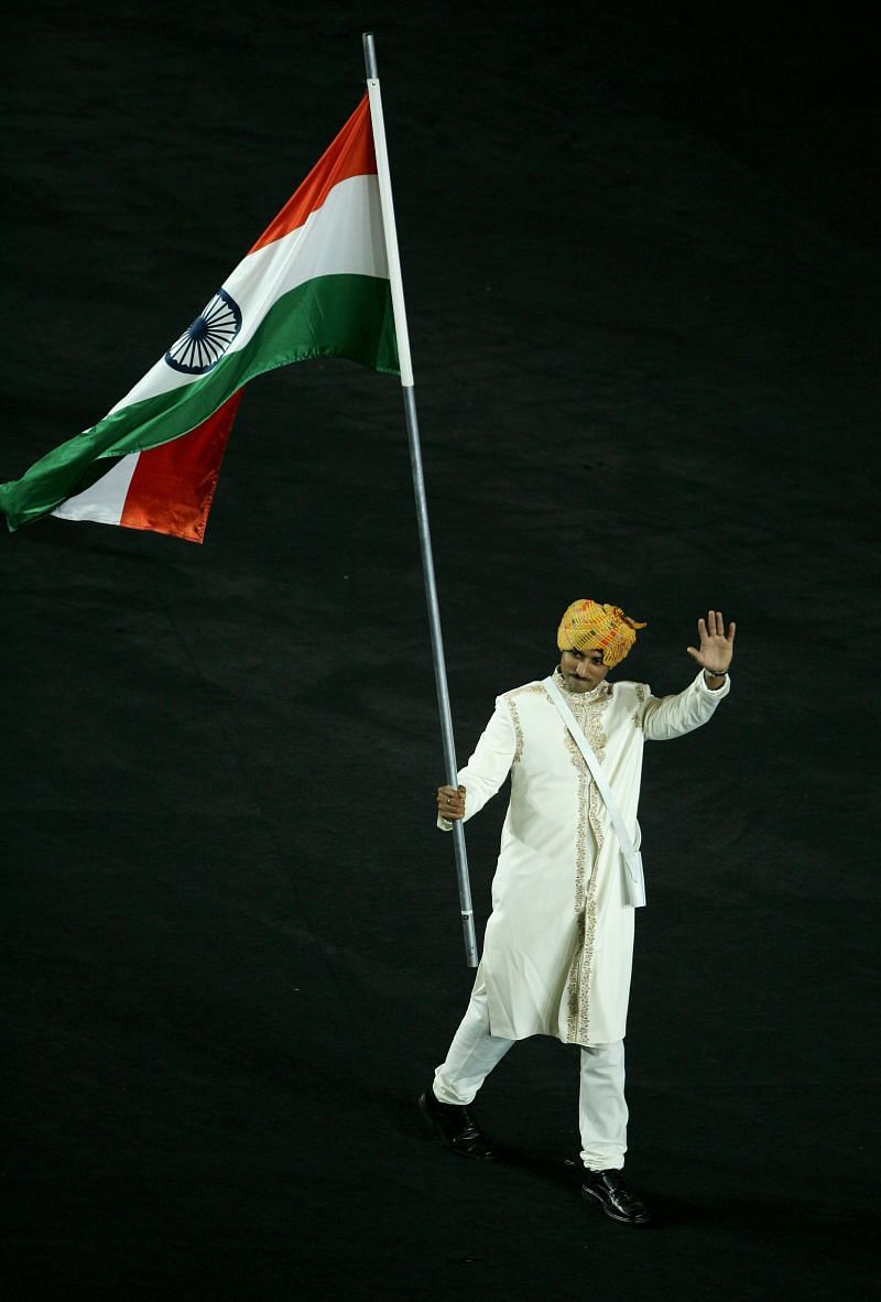 Rajyavardhan Singh Rathore carrying the Indian flag at the 18th Commonwealth Games - Opening Ceremony