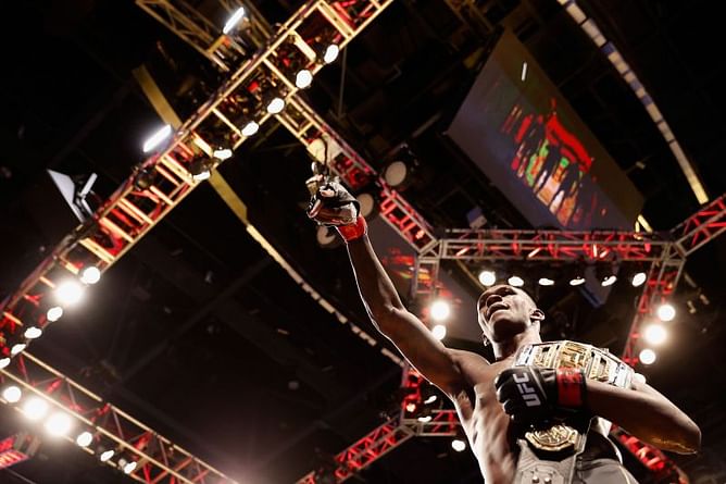 Watch: Israel Adesanya gives his UFC belt to MMA superfan Boogerbeard after UFC 263 win