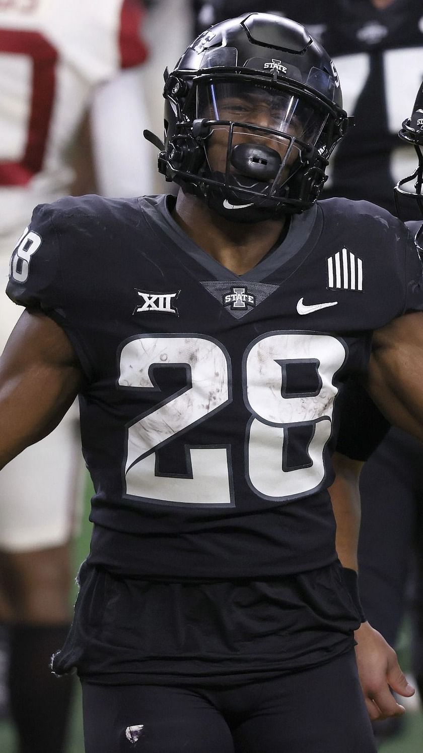 Top running backs in the 2022 NFL Draft include Isaiah Spiller, Breece Hall