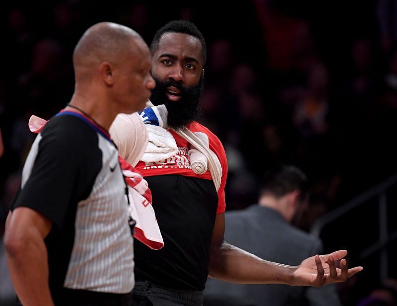 James Harden argues with a referee