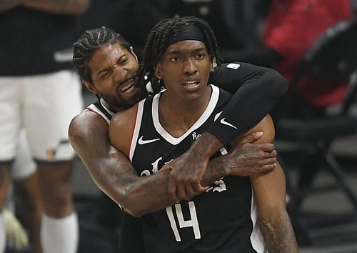 Paul George and Terance Mann celebrate a bucket