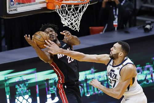 Rudy Gobert #27 blocks a shot by Jimmy Butler #22.