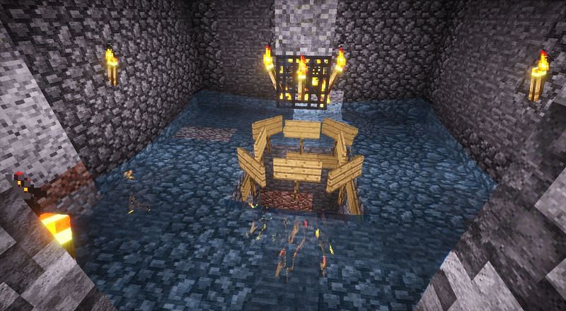 A player using a naturally found mob spawner to create a mob farm (Image via craftymynes)
