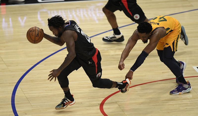 Patrick Beverley steals the ball from Donovan Mitchell