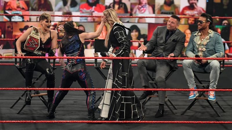 Left to right: Rhea Ripley, Nikki Cross, Charlotte Flair, The Miz, John Morrison