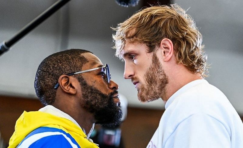 Floyd Mayweather (left) faces off against Logan Paul (right)
