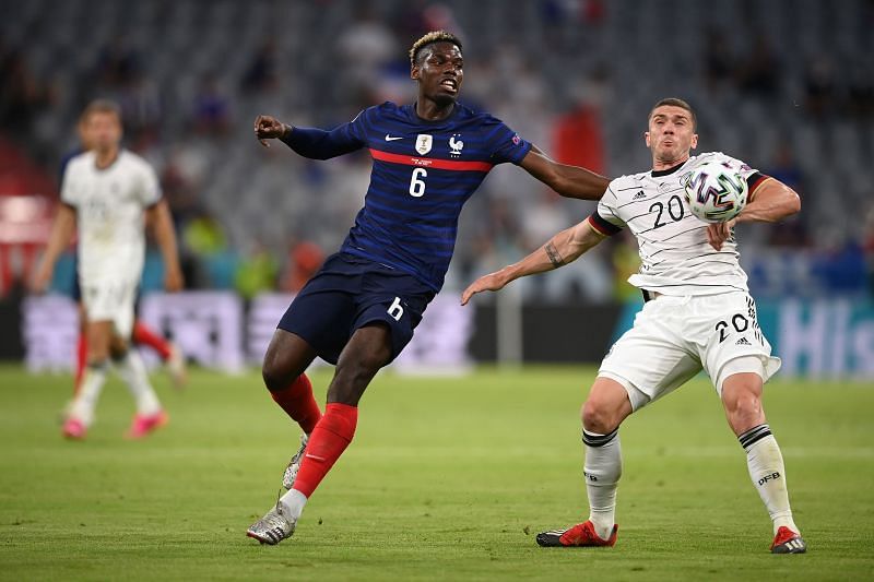 Paul Pogba (left) in action for France at Euro 2020