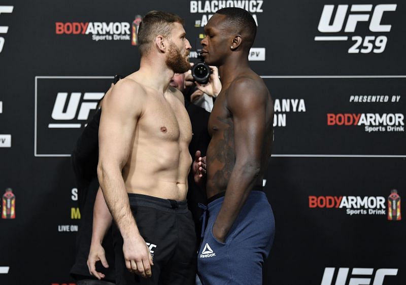 UFC light heavyweight champion Jan Blachowicz reacts to Israel Adesanya