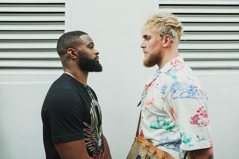Former UFC champion Tyron Woodley (left) with Jake Paul
