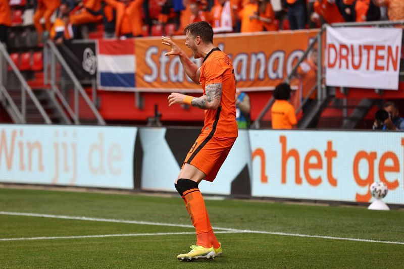 Wout Weghorst rejoices after scoring against Georgia