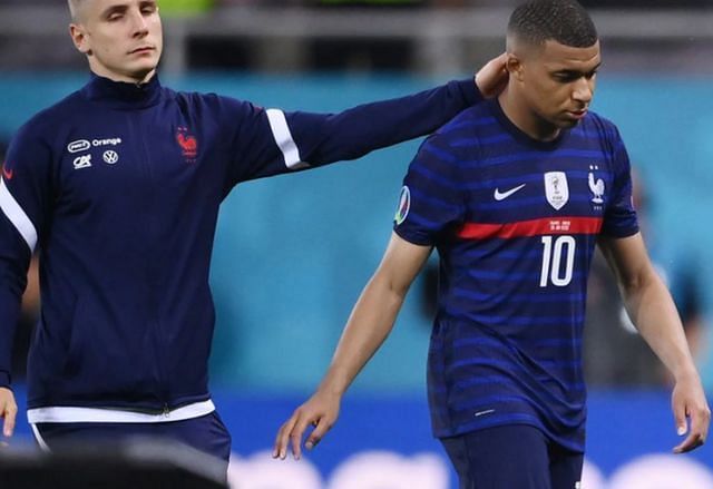 Kylian Mbappe is distraught after his missed penalty confirmed France