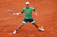 Kei Nishikori in action against Henri Laaksonen in the third round of Roland Garros 2021