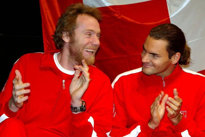 Marc Rosset (left) with Roger Federer