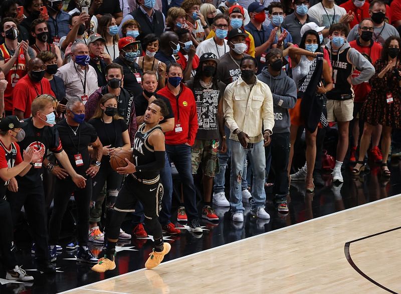 Trae Young #11 reacts after being fouled in the final seconds of their 103-100 win