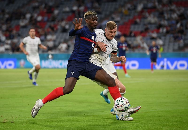 Paul Pogba battles for the ball with Toni Kroos during the Euro 2020 match between France and Germany