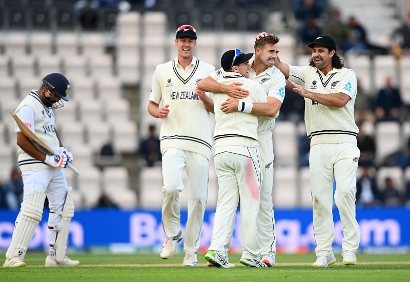 Tim Southee celebrates with teammates after dismissing Rohit Sharma. Pic: Getty Images