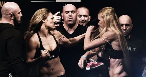 Ronda Rousey (Left) and Holly Holm (Right) during UFC 193 weigh-in face-off