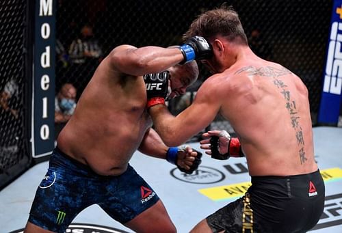 Daniel Cormier and Stipe Miocic slug it out at UFC 252