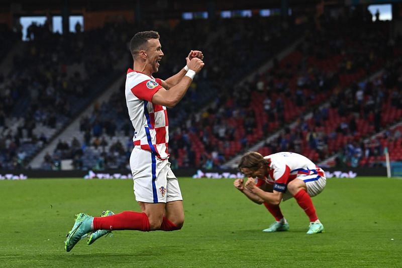 Ivan Perisic and Luka Modric celebrate after the former&#039;s goal for Croatia against Scotland