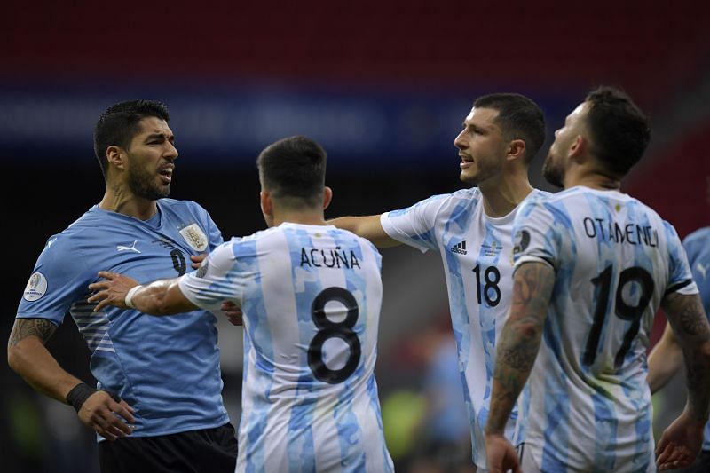 Suarez gets into a heated argument with Argentina players.
