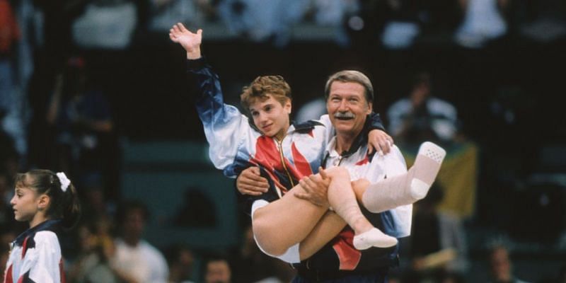 Kerri Strug carried away by her coach at the 1996 Atlanta Olympics.