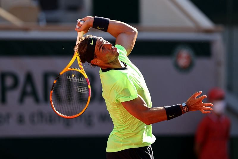 Rafael Nadal serves