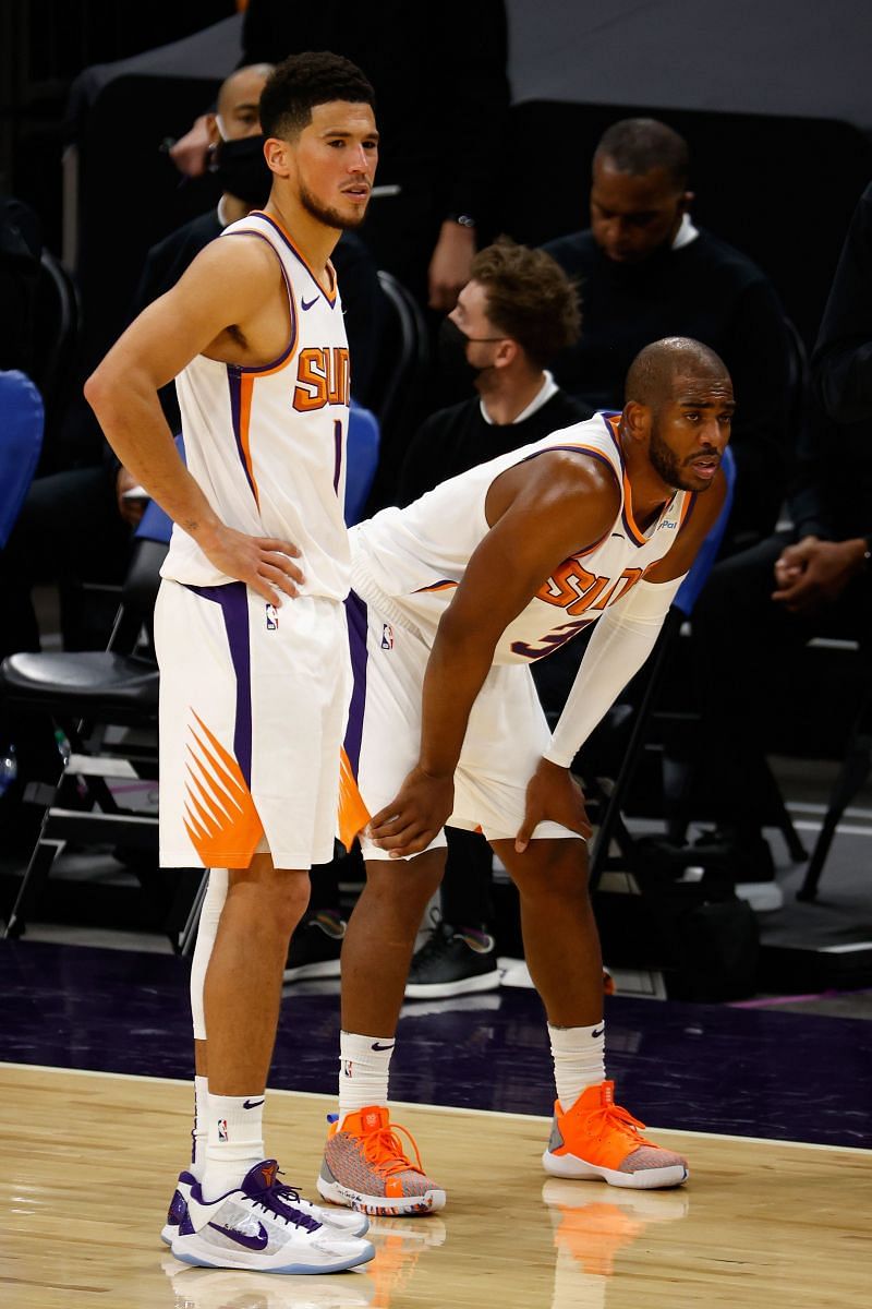 Devin Booker (#1) and Chris Paul (#3) of the Phoenix Suns