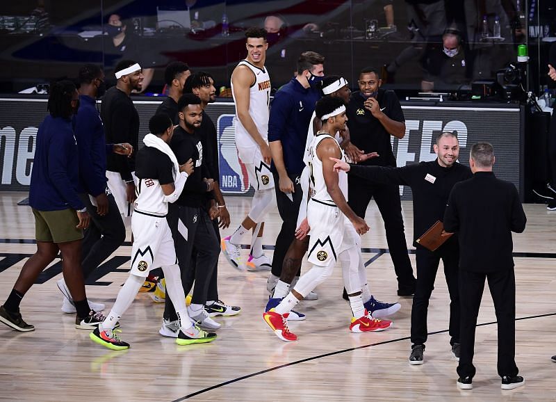 The Denver Nuggets celebrate during the fourth quarter against the LA Clippers.