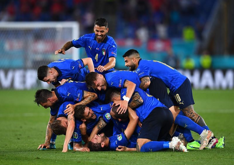 Manuel Locatelli is mobbed after scoring his second goal of the game in Italy&#039;s Euro 2020 match