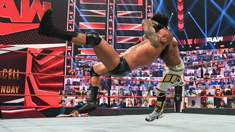 Randy Orton finishing Xavier Woods with an RKO