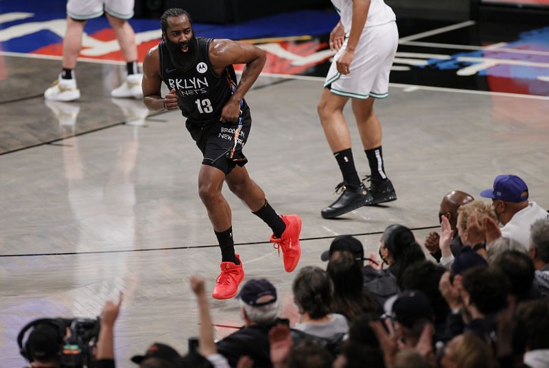 James Harden #13 reacts toward the crowd after scoring.
