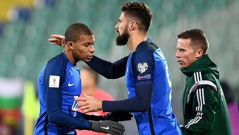 Tensions are running high between Kylian Mbappe and Olivier Giroud... it appears. Giroud and Mbappe (centre) celebrate France&#039;s FIFA World Cup win