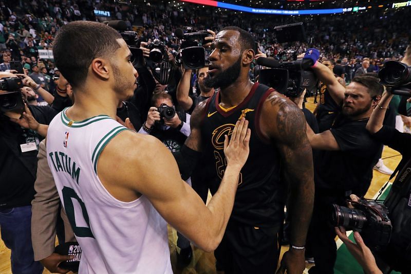 Jayson Tatum (#0) of the Boston Celtics talks with LeBron James (#23) of the Cleveland Cavaliers after Game Seven of the 2018 NBA Eastern Conference Finals.